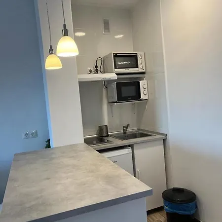 In Apartment *